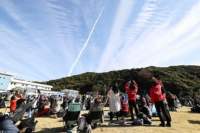 People watch Space One’s Kairos No. 2 rocket launch