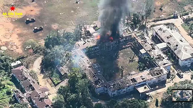 Video grab showing burning buildings in the headquarters of the army’s western command in Ann township, Rakhine state, Myanmar