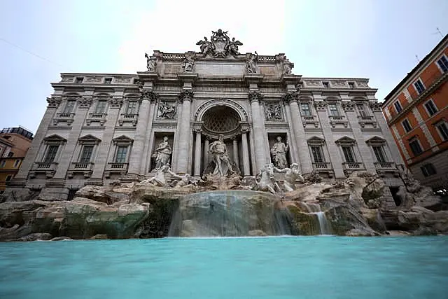 A view of the 18th century Trevi Fountain in Rome as it reopens to the public after undergoing maintenance