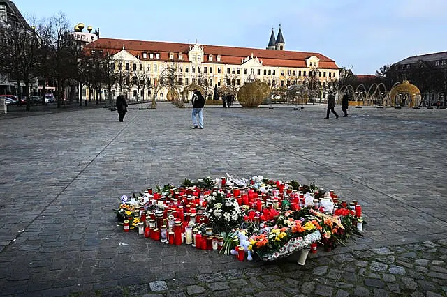 Flowers at the site of the market attack