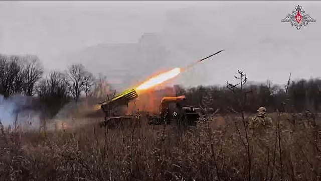 A Russian 'Grad' self-propelled multiple rocket launcher fires towards Ukrainian positions in Ukraine