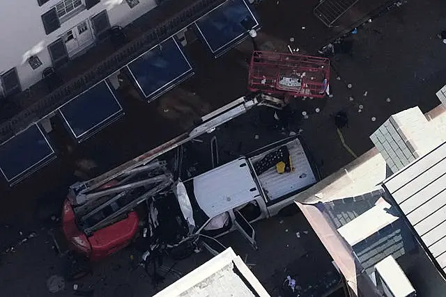 Investigators at the scene after a person drove a vehicle into a crowd earlier on Canal and Bourbon Street in New Orleans