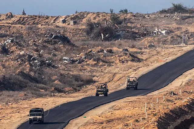 Israeli military vehicles move inside the Gaza Strip