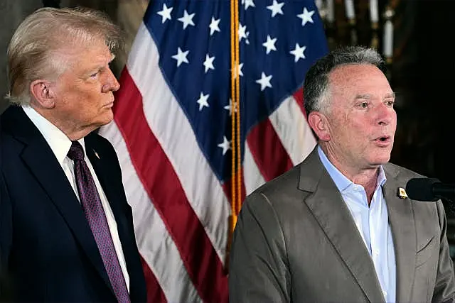 President-elect Donald Trump listens as Steve Witkoff speaks during a news conference