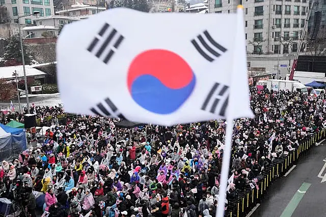 Supporters of impeached South Korean President Yoon Suk Yeol stage a rally to oppose his impeachment near the presidential residence