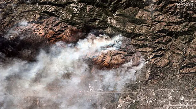 Satellite image showing the Eaton fire burning in and near Altadena 