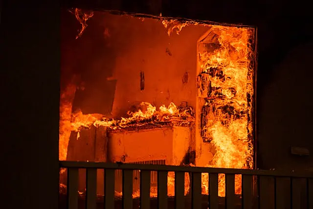 A house burning in the Eaton Fire in Altadena, California