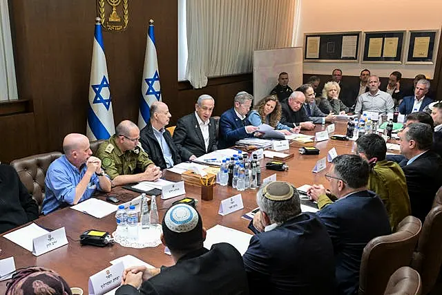 Israeli Prime Minister Benjamin Netanyahu, centre, with his security Cabinet