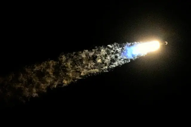 A SpaceX Falcon 9 rocket lifts off from pad 39A with a payload of a pair of lunar landers at the Kennedy Space Center in Cape Canaveral