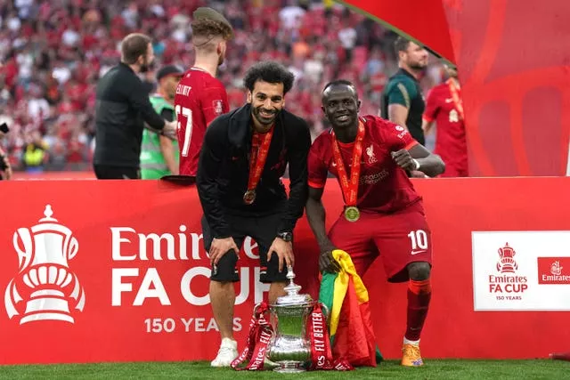 Mohamed Salah, left, and Sadio Mane celebrates Liverpool's FA Cup win