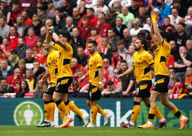 Pedro Neto, left, put Wolves ahead at Anfield (Peter Byrne/PA)