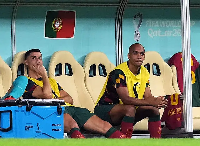 Cristiano Ronaldo (left) started on the bench against Switzerland 