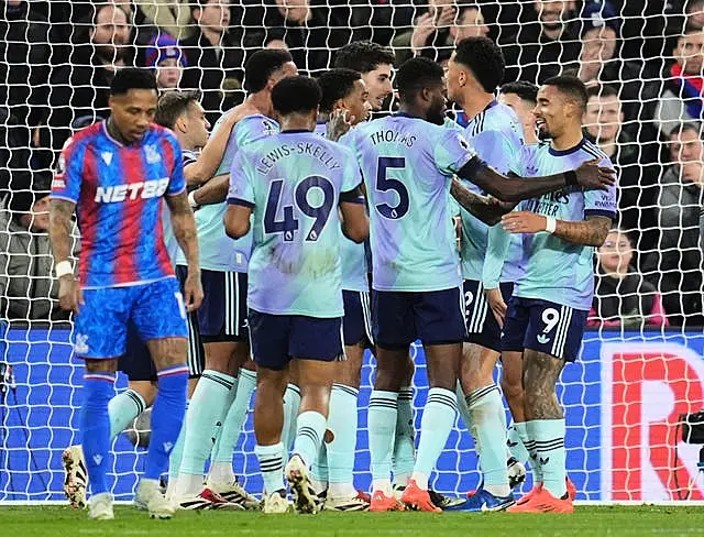 Arsenal players celebrate Kai Havertz's goal with a group hug