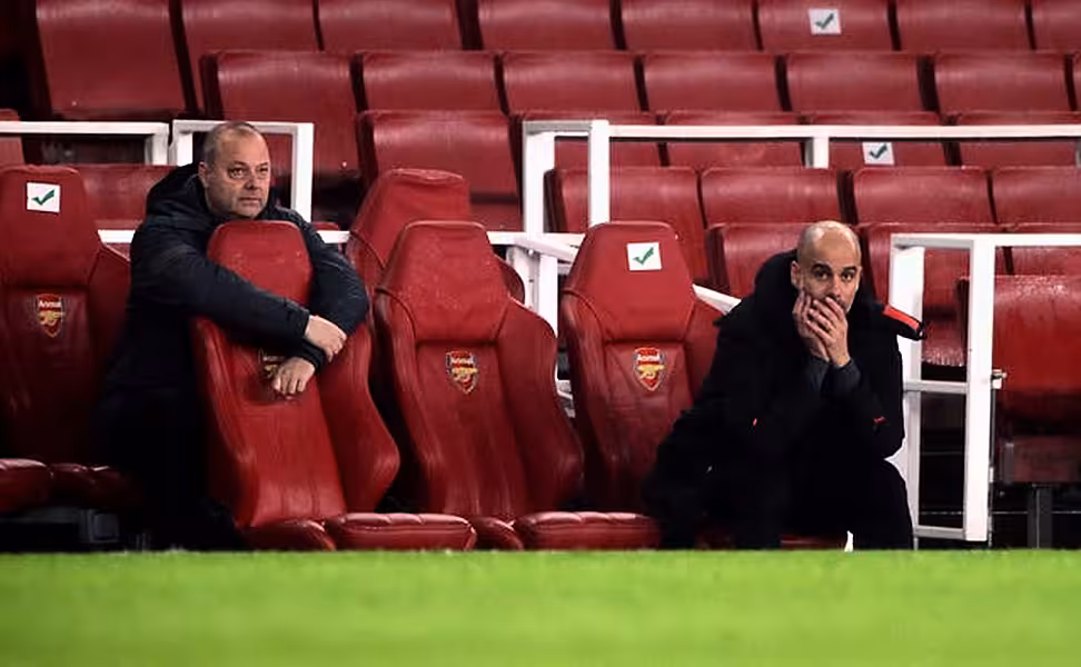 Pep Guardiola, right, believes Mikel Arteta should be given more time by Arsenal