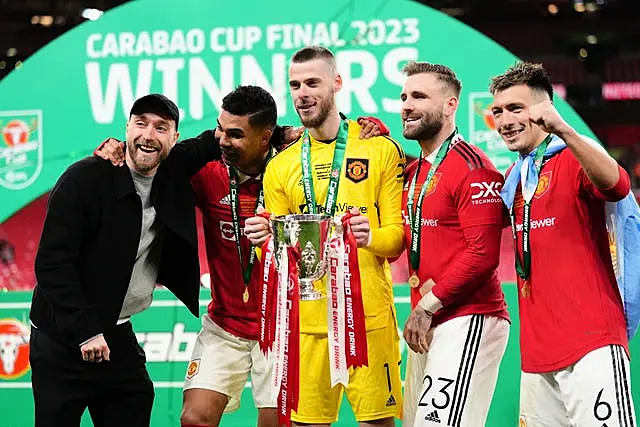 Christian Eriksen, left, missed the Carabao Cup final success through injury