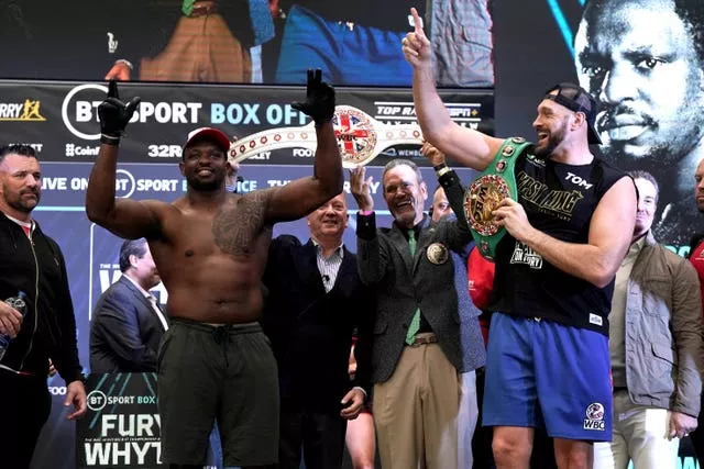 Tyson Fury, right, and Dillian Whyte were in playful mood at Friday's weigh-in (Nick Potts/PA)