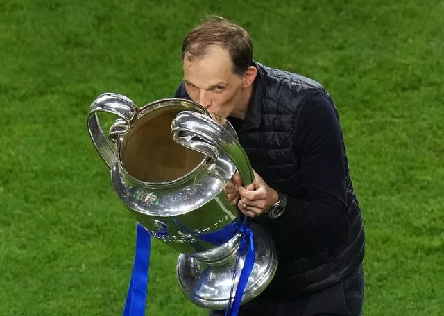 Thomas Tuchel kisses the Champions League trophy after Chelsea's triumph in 2021