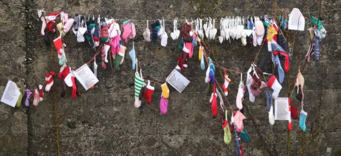 Children's socks at the grotto on an unmarked mass grave at the site of the Tuam Mother and Baby Home run by the Bon Secures sister