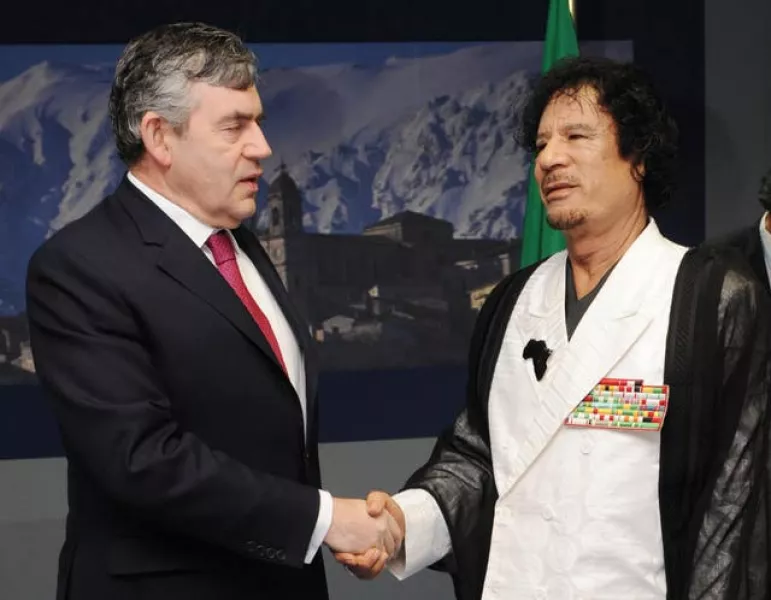 Libya's then leader Muammar Gaddafi with Gordon Brown at the G8 Summit in L’Aquila (Stefan Rousseau/PA)