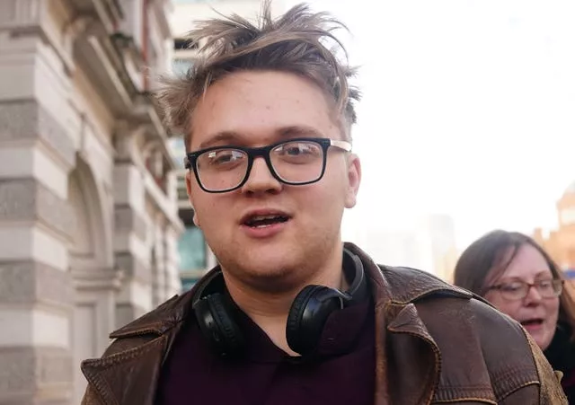 Harry May leaves Westminster Magistrates’ Court in London after pleading guilty to throwing an egg towards King Charles during a walkabout in Luton