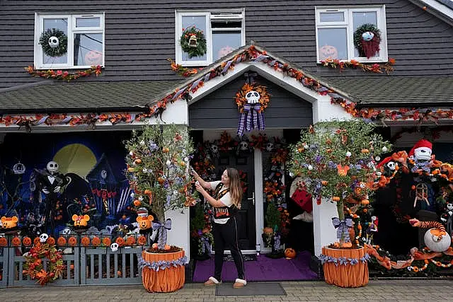 Lavinia Hedges putting the finishing touches to a Nightmare Before Christmas themed display