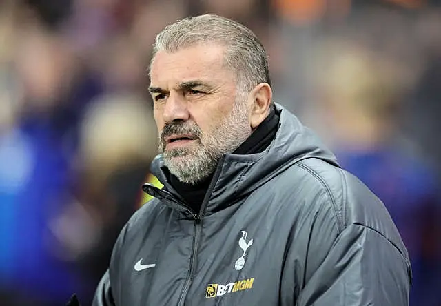 Ange Postecoglou looks serious at a match earlier this month