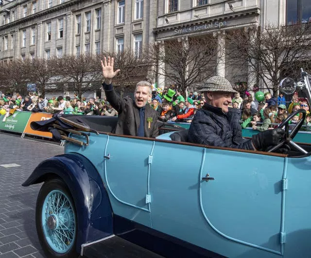 Patrick Kielty, this year’s Grand Marshal, takes part in the St Patrick’s Day Parade in Dublin 