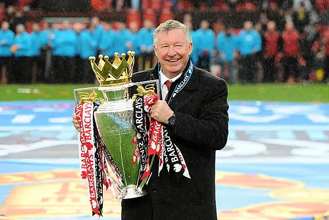 Sir Alex Ferguson with the Premier League trophy