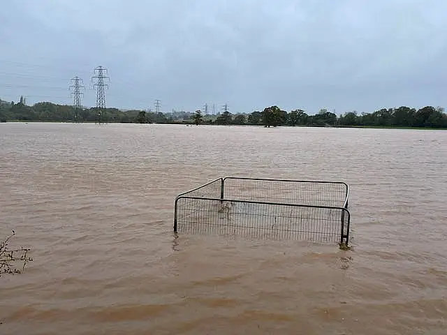 Flood water covers a field after the River Clyde overflowed in Clyst Saint Mary, near Exeter