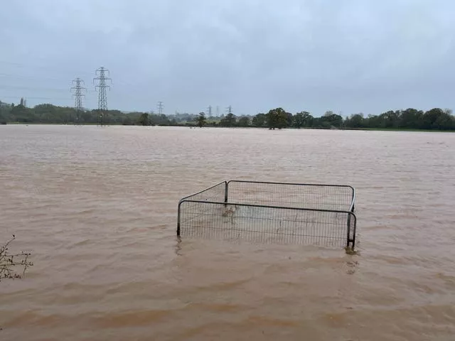 Flood water covers a field after the River Clyde overflowed in Clyst Saint Mary, near Exeter