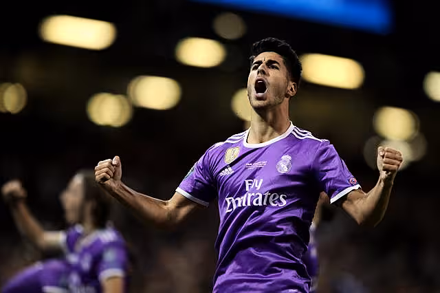 Real Madrid’s Marco Asensio celebrates scoring his side’s fourth goal of the game during the UEFA Champions League Final at the National Stadium, Cardiff