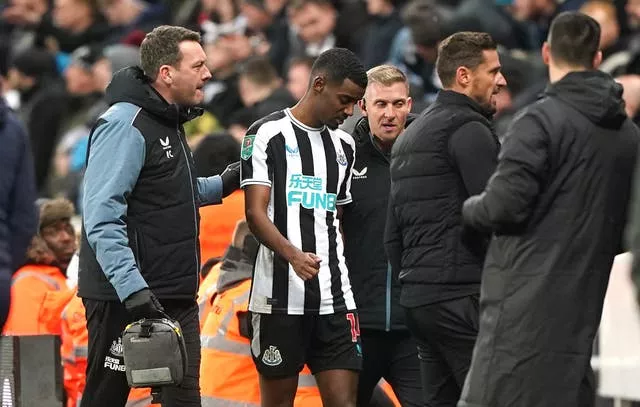 Newcastle striker Alexander Isak leaves the pitch after a suffering blow to the head against Southampton on Tuesday evening