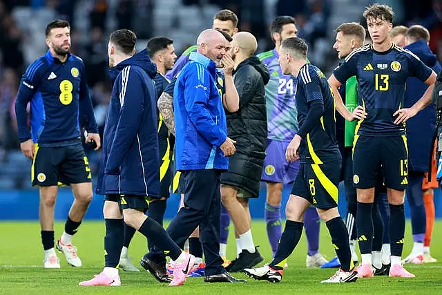 Steve Clarke, centre, with his players after Scotland's draw with Finland