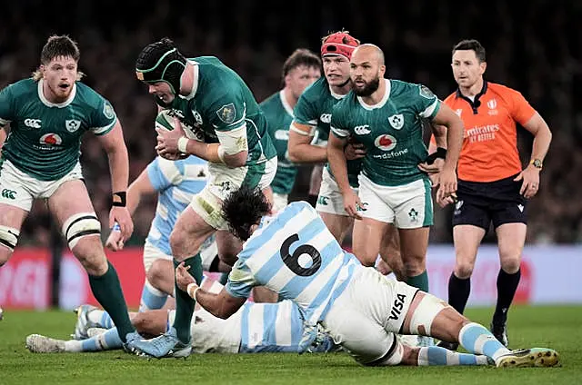 Ireland’s James Ryan, centre left, is tackled by Argentina’s Pablo Matera, centre right