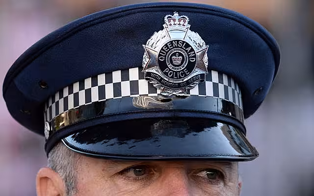 A police officer looks on