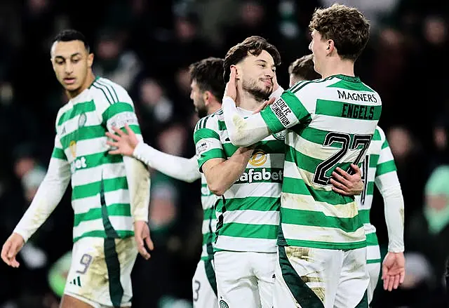 Celtic’s Nicolas Kuhn (centre celebrates with Arne Engels after scoring