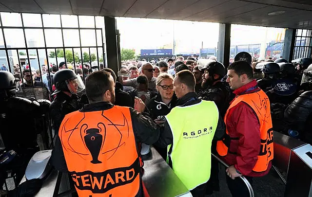 Liverpool fans queuing outside the Stade de France