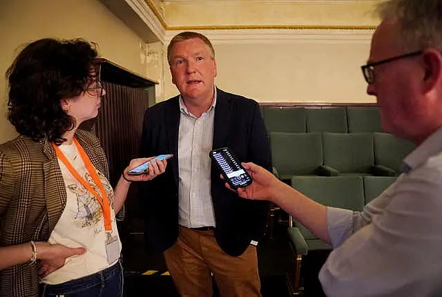 Michael McGrath speaks to the media at Cork City Hall 