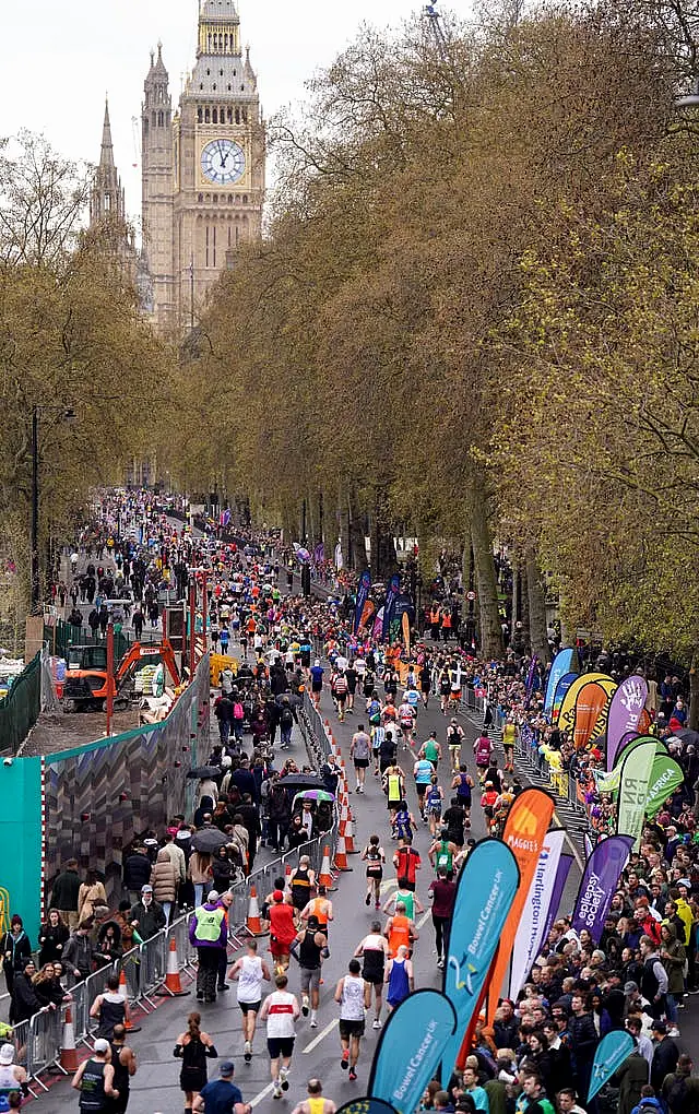 Competitors pass Big Ben and through Westminster