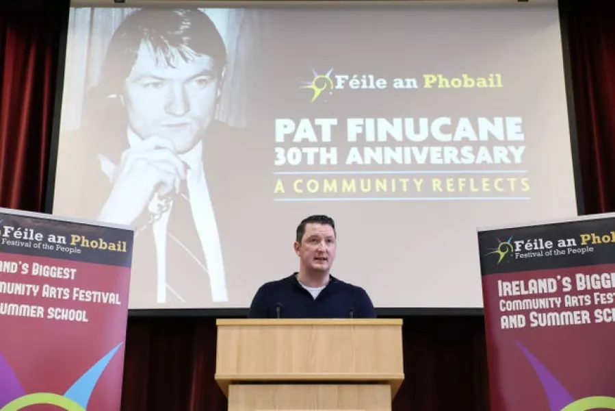 John Finucane speaking at St Mary's University College Belfast at an event to mark the 30th anniversary of the death of his father, Belfast solicitor Pat Finucane (Kelvin Boyes/AP)