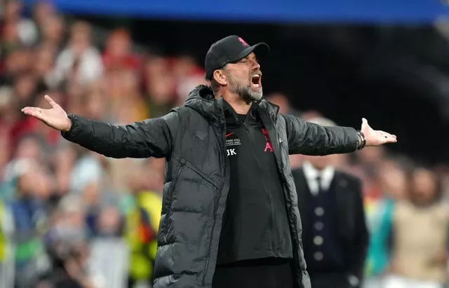 Liverpool manager Jurgen Klopp spreads his arms out