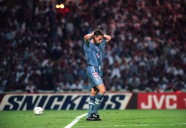 Gareth Southgate dejected after failing to score in the penalty shoot-out loss to Germany at Euro 96