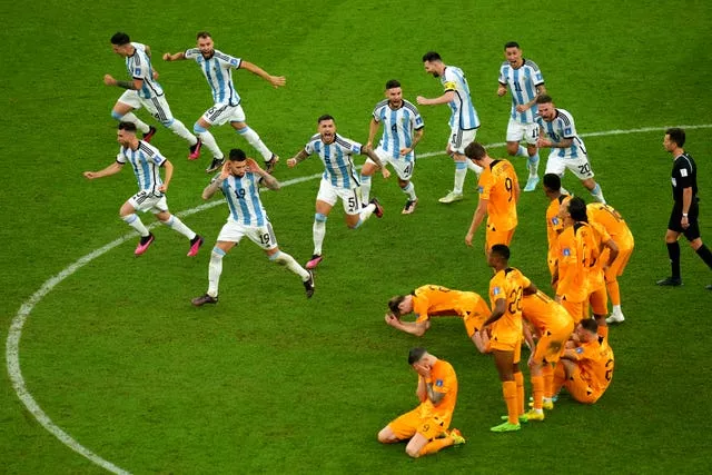 Argentina players celebrate after winning the penalty shootout