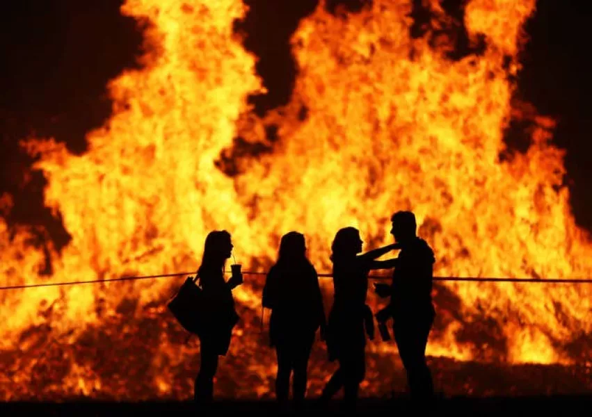 The huge bonfire in Craigyhill, Larne, is lit on the Eleventh night to usher in the Twelfth commemoration