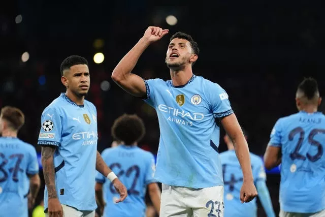 Matheus Nunes points to the sky after scoring for Manchester City 