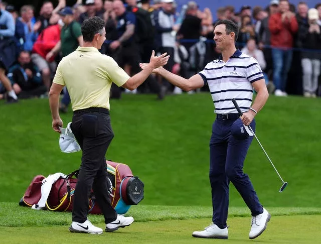 Rory McIlroy and Billy Horschel shake hands