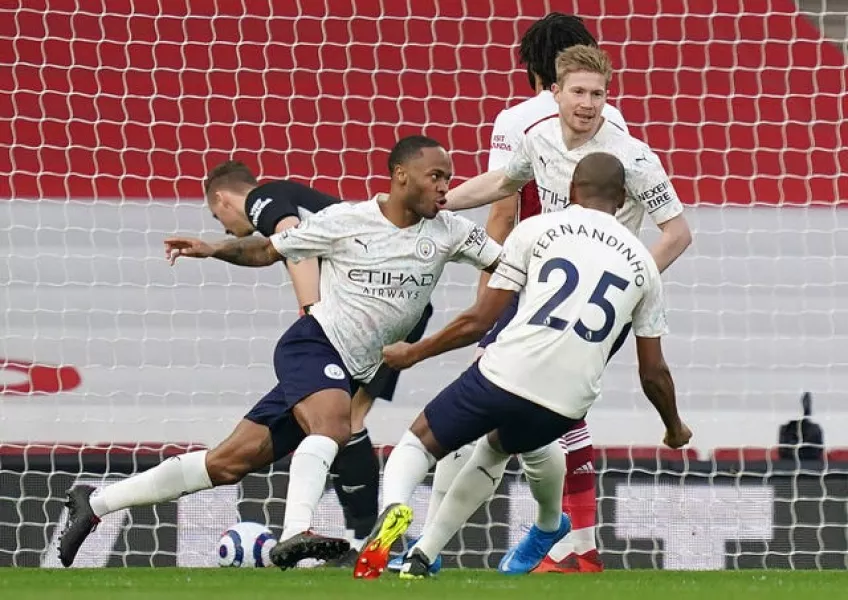 Raheem Sterling celebrates scoring 