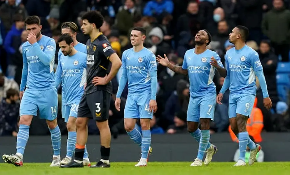 Raheem Sterling, second right, celebrates his 100th Premier League goal