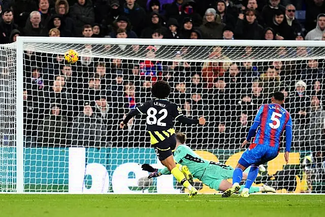 Lewis scores Manchester City's second goal of the game during the Premier League match at Selhurst Park, London.