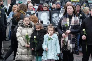 Families in the Creggan area of Derry before the remembrance walk